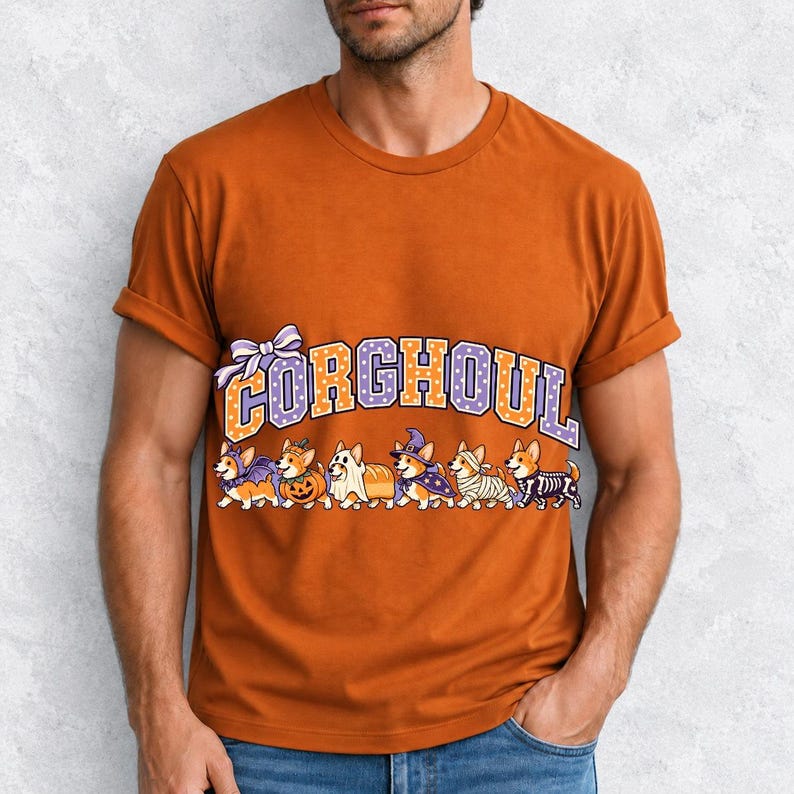 Six corgis in Halloween costumes walking under the arched word CORGHOUL, lavender and orange polka-dot varsity style