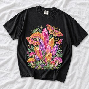Retro 70s psychedelic glitter crystal cluster with moths and small frogs in pink, mustard, violet and mint