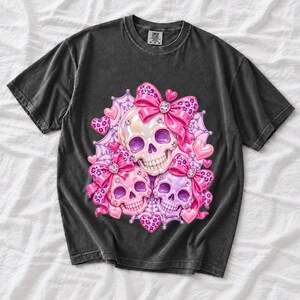 Puffy glossy 3D pink skulls with bows, hearts, cobwebs and rhinestones in coquette style