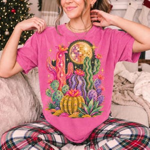 Retro 70s psychedelic glitter cacti with a disco ball moon in pink, mustard, violet and mint