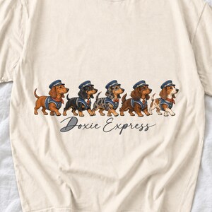 Illustrated dachshunds in conductor hats lined up like a train, text Doxie Express
