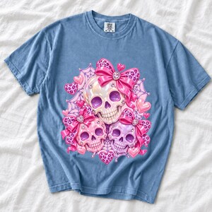 Puffy glossy 3D pink skulls with bows, hearts, cobwebs and rhinestones in coquette style
