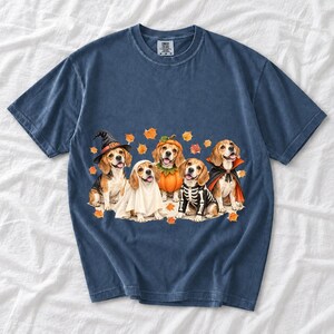 Five watercolor beagles in witch, ghost, pumpkin, skeleton and vampire costumes with floating autumn leaves