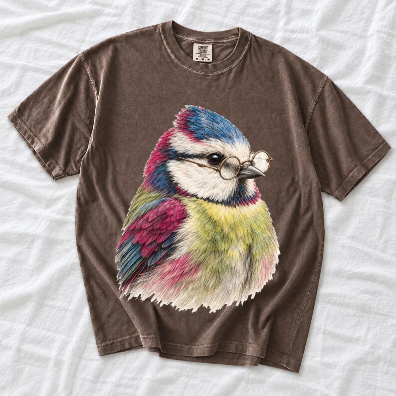Colored-pencil blue tit bird wearing tiny round reading glasses, funny birdwatcher t-shirt illustration