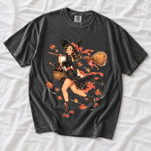 Retro 1950s pin-up witch on roller skates with a broom and a cat in a basket, autumn leaves