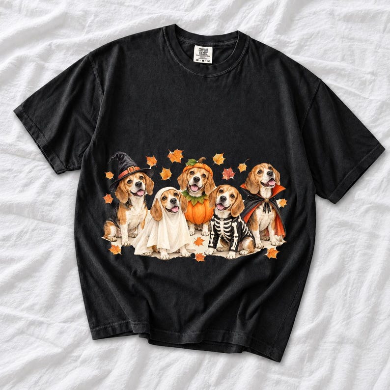 Five watercolor beagles in witch, ghost, pumpkin, skeleton and vampire costumes with floating autumn leaves