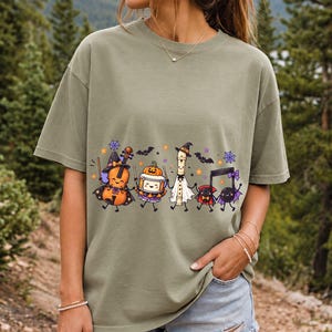 Kawaii violin, drum, recorder and notes with faces in Halloween costumes, pastel purple and orange
