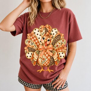 Turkey with patchwork fabric tail feathers decorated with bows on a cream and polka-dot stripe background