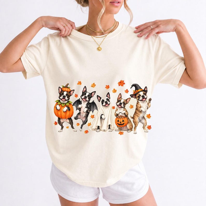 Five watercolor Boston terriers in Halloween costumes with falling autumn leaves