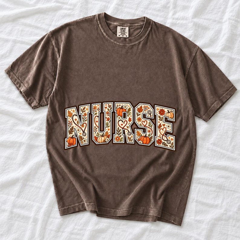 Arched varsity word NURSE filled with autumn leaves, stethoscopes and pumpkins in cream, rust and mustard