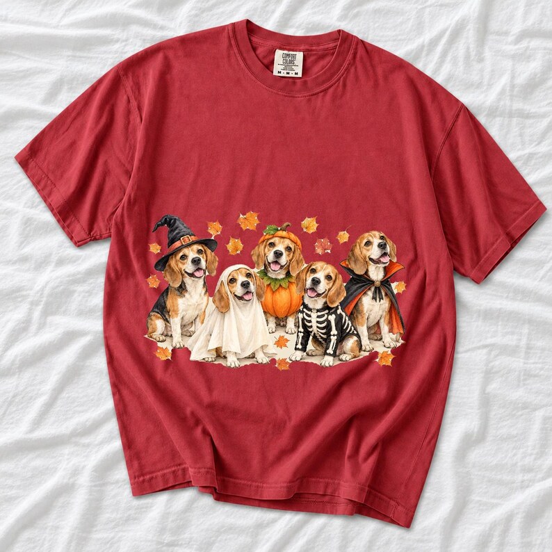 Five watercolor beagles in witch, ghost, pumpkin, skeleton and vampire costumes with floating autumn leaves