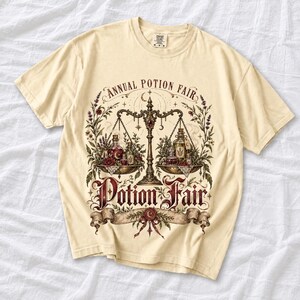 Vintage poster style apothecary scale with potion bottles and a ribbon banner reading Annual Potion Fair
