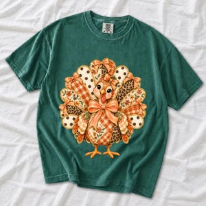 Turkey with patchwork fabric tail feathers decorated with bows on a cream and polka-dot stripe background
