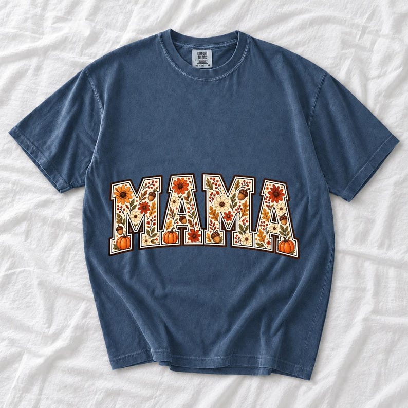 Arched varsity word MAMA filled with fall flowers and acorns in cream, rust and mustard