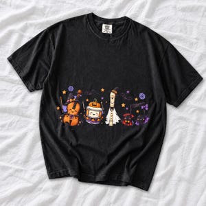 Kawaii violin, drum, recorder and notes with faces in Halloween costumes, pastel purple and orange