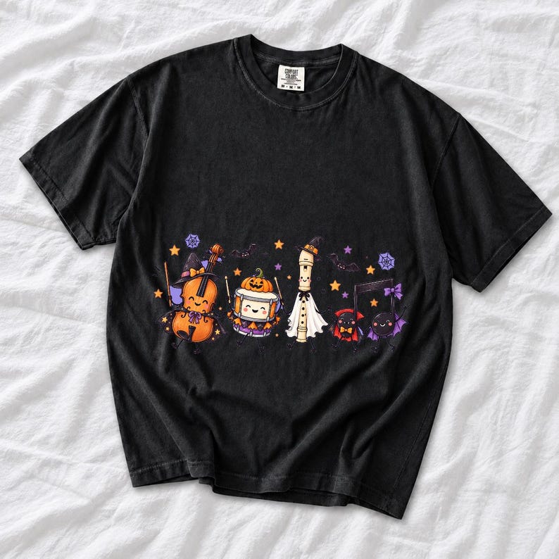 Kawaii violin, drum, recorder and notes with faces in Halloween costumes, pastel purple and orange