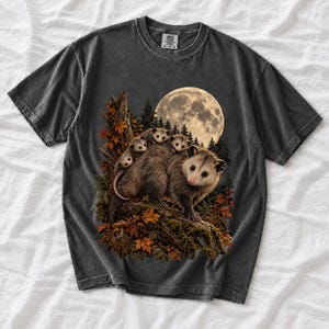 Mother opossum with babies on her back under a full moon and autumn leaves, dark realistic woodland illustration