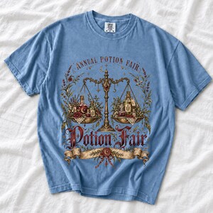 Vintage poster style apothecary scale with potion bottles and a ribbon banner reading Annual Potion Fair