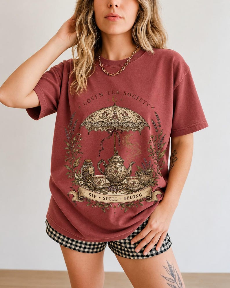 Vintage poster style ornate teapot with crescent moon steam, teacups and herbs, text Coven Tea Society