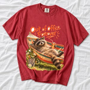 Raccoon relaxing in a hammock with a soda can and sunglasses, 90s film photo style, text "Out of Office Forever"