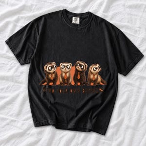 Four ferrets in tiny ties in a row with the text "Mind Your Own Business"