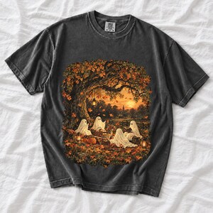 Vintage oil painting of sheet ghosts having a picnic under oak trees with falling autumn leaves at golden hour