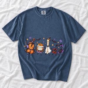 Kawaii violin, drum, recorder and notes with faces in Halloween costumes, pastel purple and orange