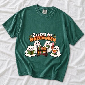 Four kawaii ghosts with books, a library cart and bookmarks, text Booked for Halloween