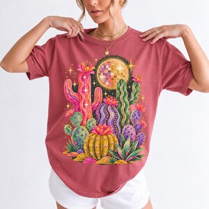 Retro 70s psychedelic glitter cacti with a disco ball moon in pink, mustard, violet and mint