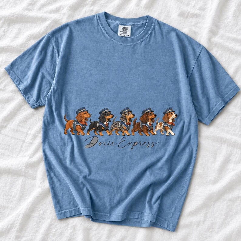Illustrated dachshunds in conductor hats lined up like a train, text Doxie Express