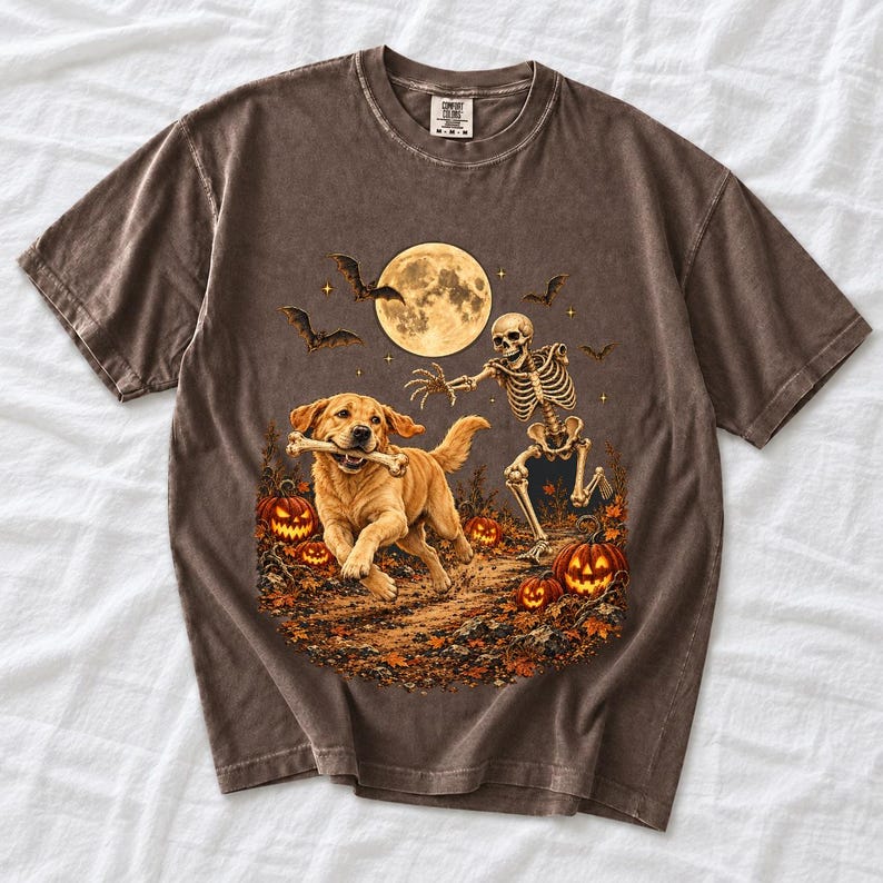 A skeleton chasing a golden labrador that stole its arm bone under a full moon with jack o lanterns and bats