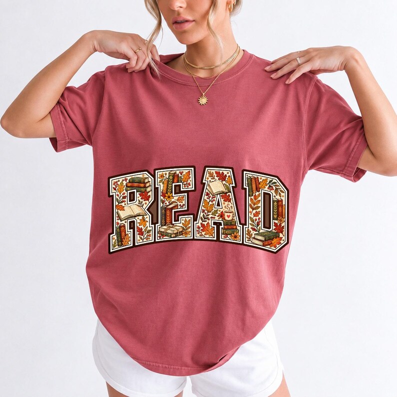 Arched varsity word READ filled with tiny books and autumn leaves in cream, rust and mustard