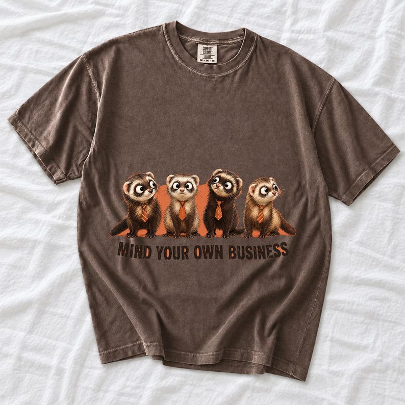 Four ferrets in tiny ties in a row with the text "Mind Your Own Business"