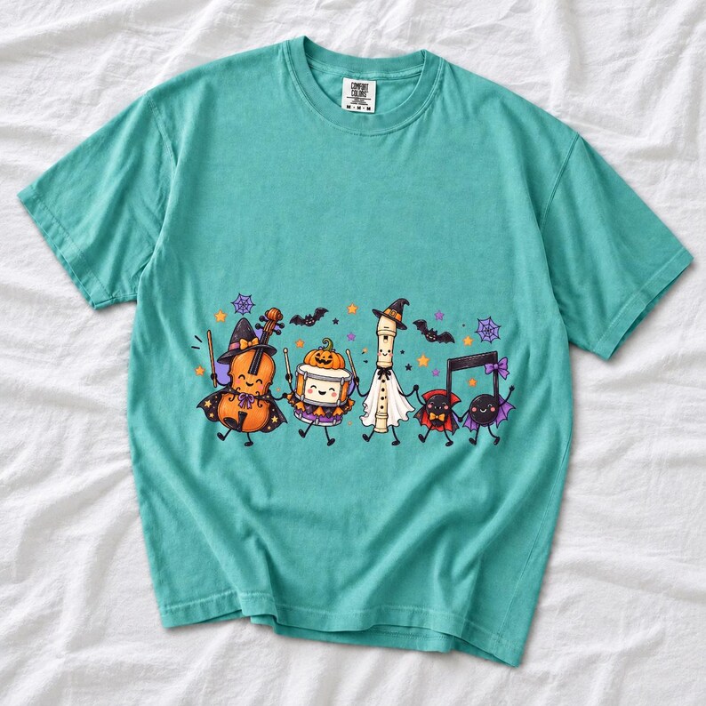 Kawaii violin, drum, recorder and notes with faces in Halloween costumes, pastel purple and orange