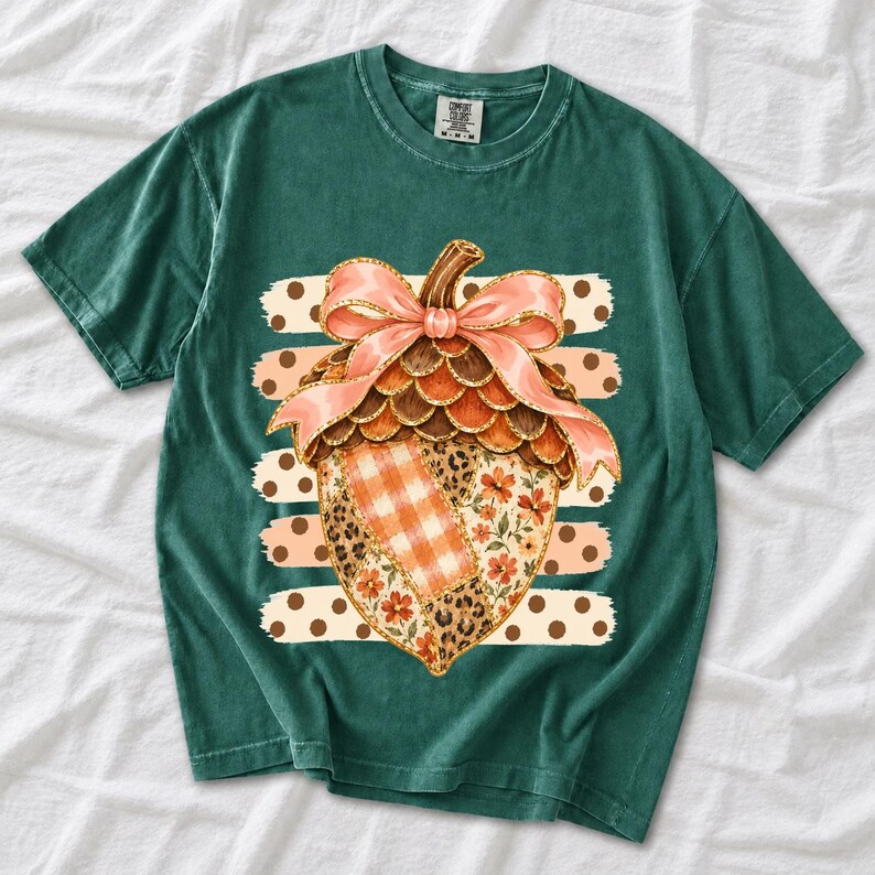 Giant patchwork acorn with a pink satin bow made of plaid, leopard and floral fabric on polka-dot stripes