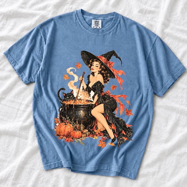 Retro 1950s pin-up witch winking while stirring a cauldron with a black cat peeking over the rim, autumn leaves