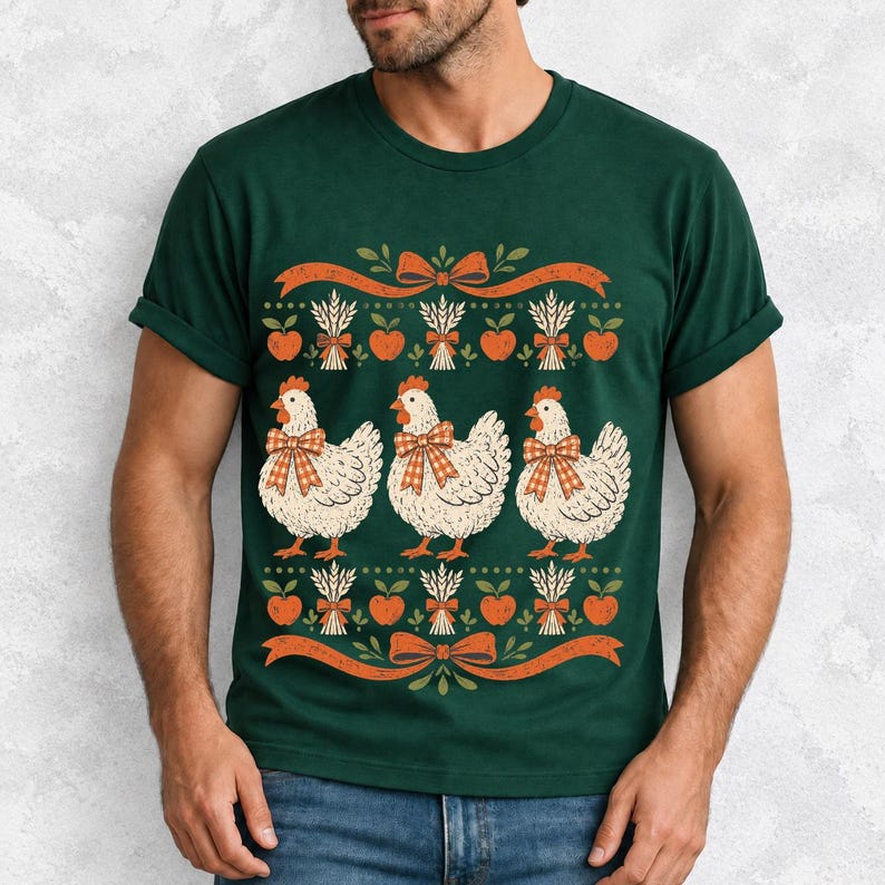 Three fluffy hens with gingham bows between apple and wheat borders, retro folk art fall t-shirt design
