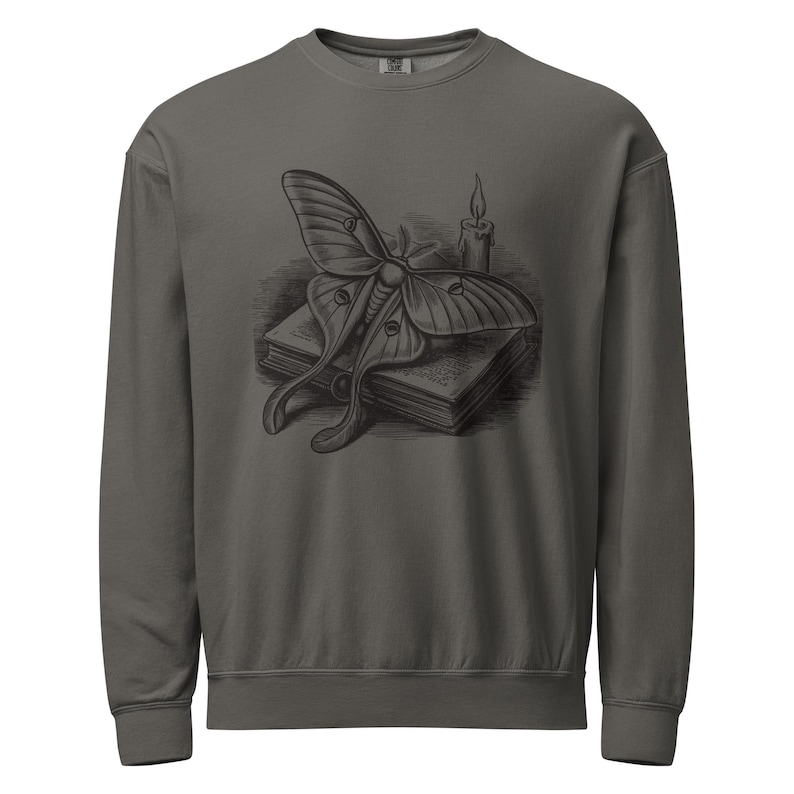Luna Moth on Open Book Sweatshirt by AeroBeloved