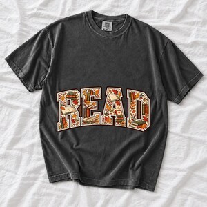 Arched varsity word READ filled with tiny books and autumn leaves in cream, rust and mustard