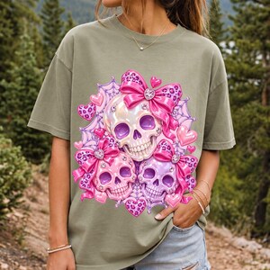 Puffy glossy 3D pink skulls with bows, hearts, cobwebs and rhinestones in coquette style