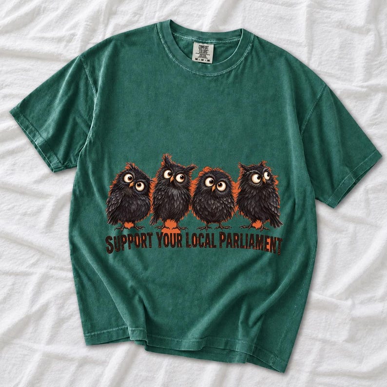 Four fluffy big-eyed black owls in a row with the text "Support Your Local Parliament"