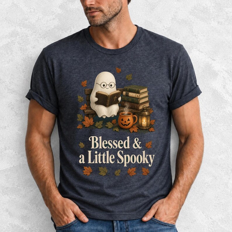 Cute ghost with glasses reading a Bible with a candle and mug, text "Blessed & a Little Spooky", retro fall illustration