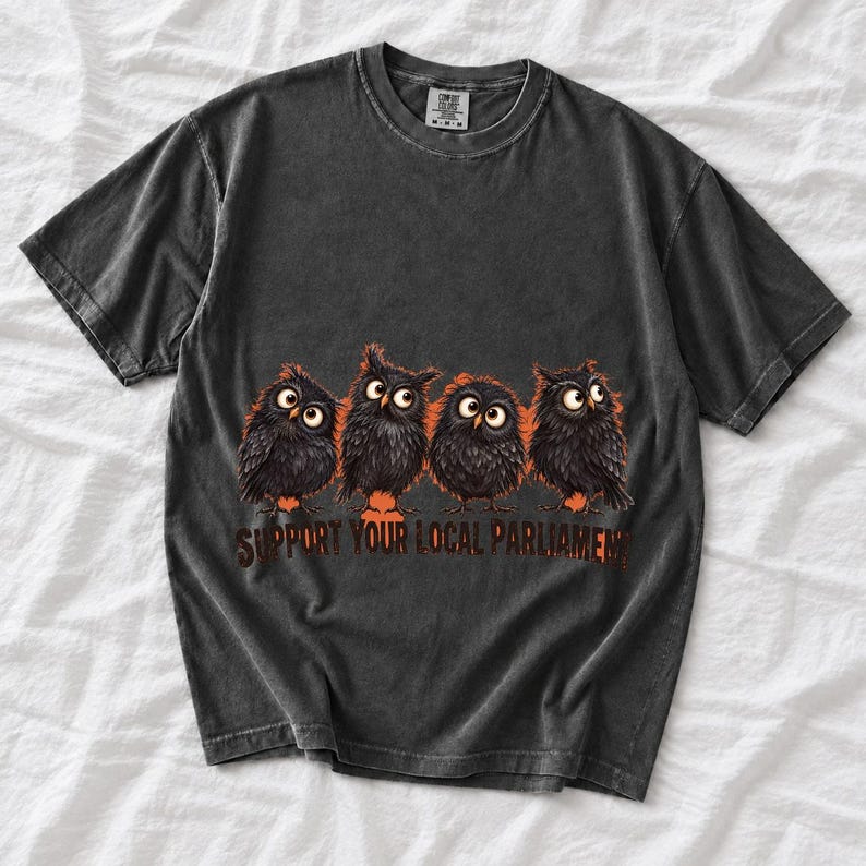 Four fluffy big-eyed black owls in a row with the text "Support Your Local Parliament"