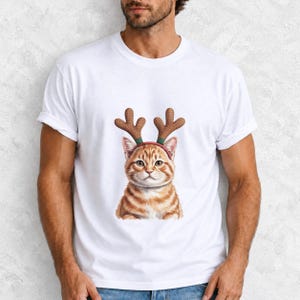 Comfort Colors Cat Reindeer Antlers Shirt, Orange Tabby Cat Christmas Tee, Grumpy Cat Reindeer T-shirt, Cat Mom Holiday Shirt, Cat Xmas Tee
