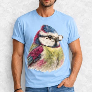 Colored-pencil blue tit bird wearing tiny round reading glasses, funny birdwatcher t-shirt illustration