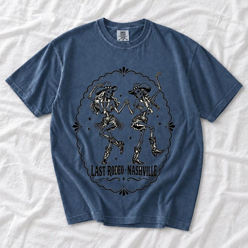 Two cowgirl skeletons in hats line dancing in a starry frame with the text Last Rodeo Nashville