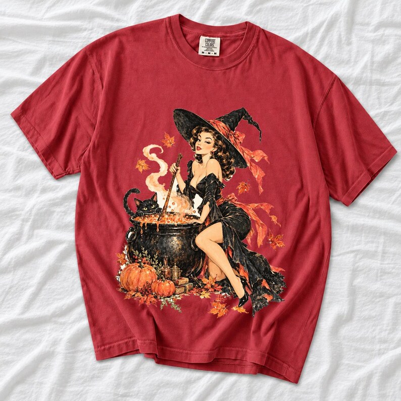 Retro 1950s pin-up witch winking while stirring a cauldron with a black cat peeking over the rim, autumn leaves
