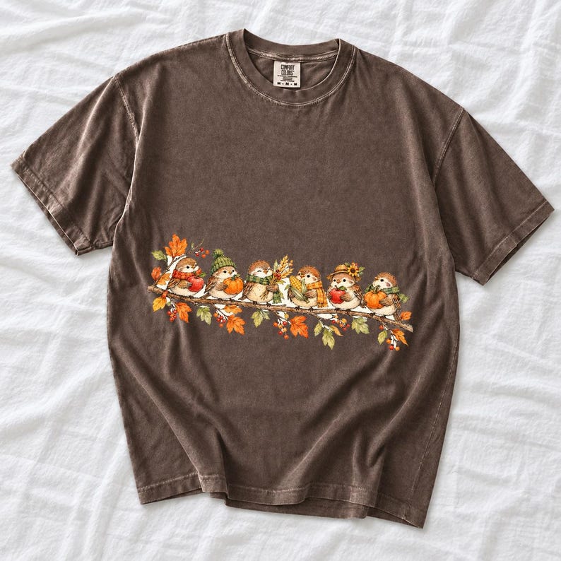 Row of watercolor sparrows on a branch holding tiny apples, corn and a pumpkin for harvest