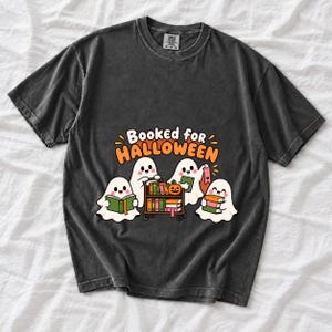 Four kawaii ghosts with books, a library cart and bookmarks, text Booked for Halloween