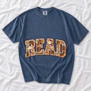Arched varsity word READ filled with tiny books and autumn leaves in cream, rust and mustard